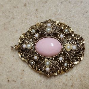 Avon vintage pendant with pink stone.